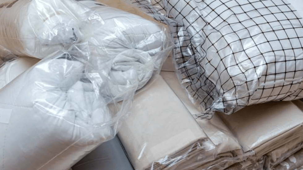How to Pack Bedding for Moving: Space-Saving Solutions for Bulky Items